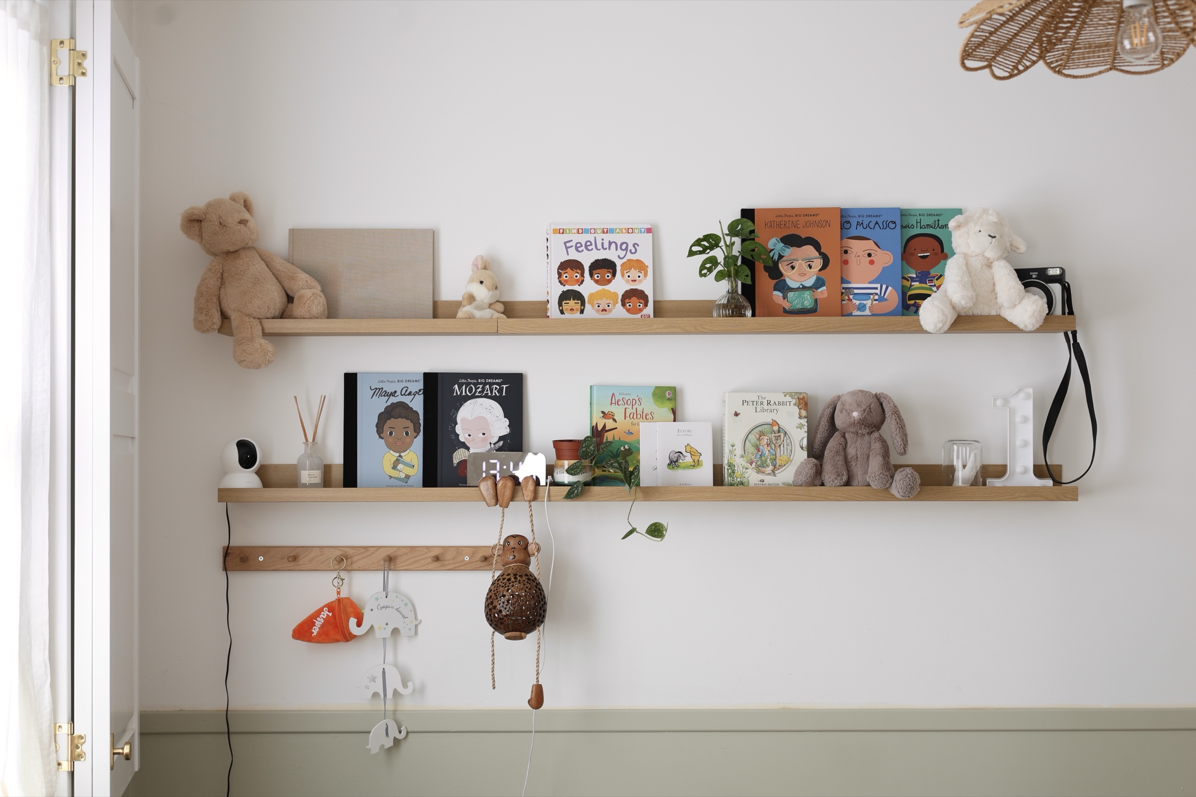 Books, soft toys and sensory details in the Root and Bloom baby room