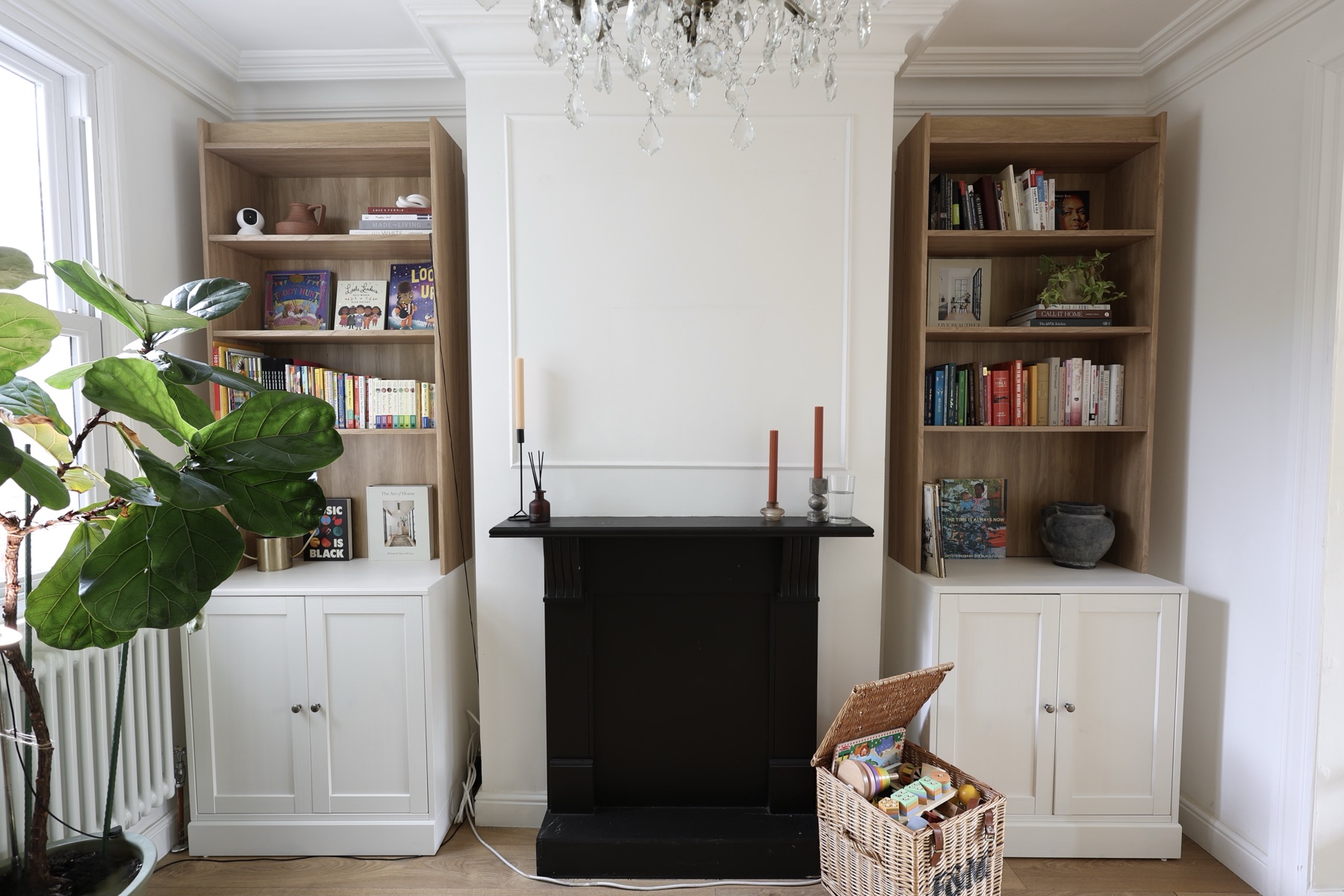 The main area bookshelves and prepared play basket